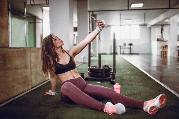 istock Female Taking Selfie In Gym 1199309081