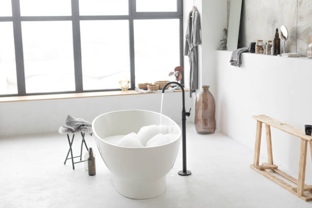 istock Stunning master bathroom interior in luxury home with bathtub 1199311805