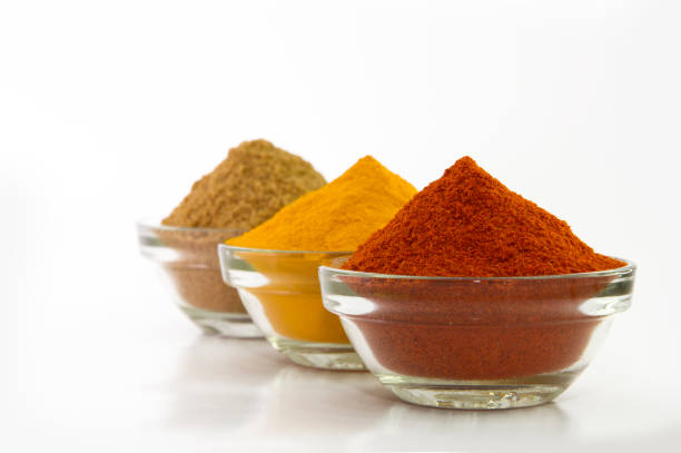 istock Spice Powder : Chili, Turmeric & Coriander in Bowl isolated on White background. 1199311854