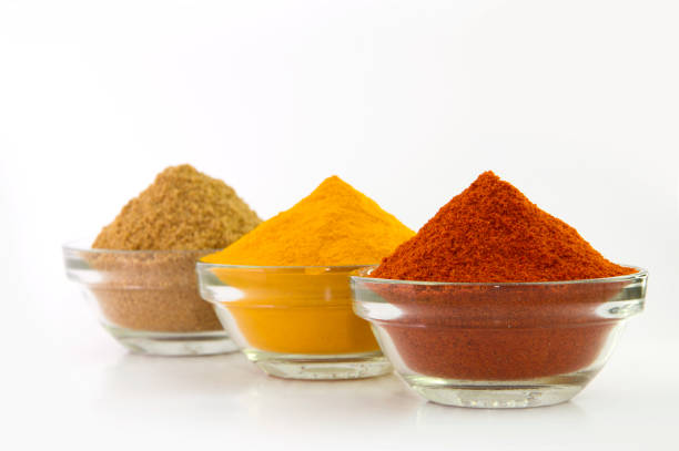 istock Spice Powder : Chili, Turmeric & Coriander in Bowl isolated on White background. 1199313771