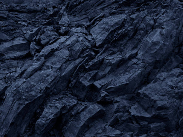 istock Blue grunge background. Toned mountain texture. Close-up. Monochrome. 1199314296