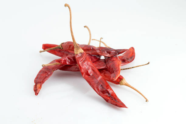 Red Chilli peppers isolated on white stock photo