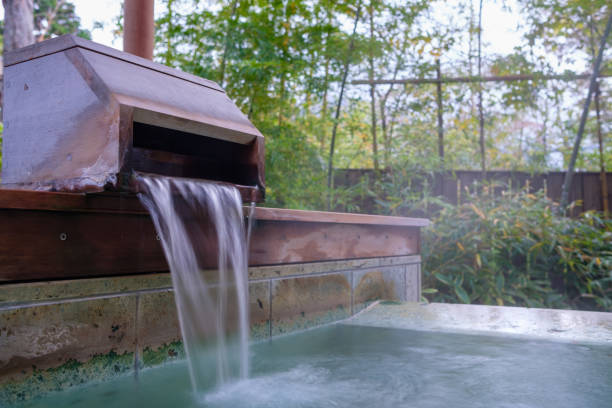 istock Fresh hot spring water filling a bath 1199321703