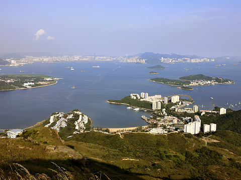 Panorama of Discovery Bay and Hong Kong island from Lo Fu Tau, also known as Tiger's Head, located in the Lantau North Country Park. The hike goes from Tung Chung to Discovery Bay with another path connected to the Olympic Trail which goes from Tung Chung to Mui Wo.