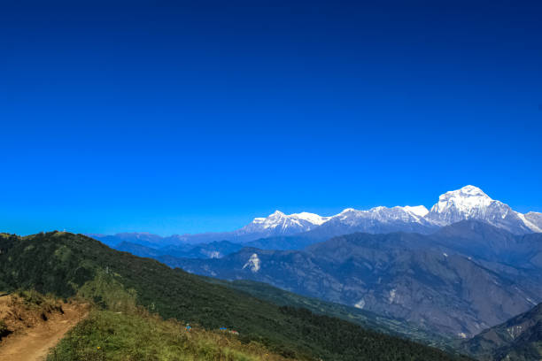 istock Beautiful and Amazing Snow-covered Mountain With Blue Sky 1199322828