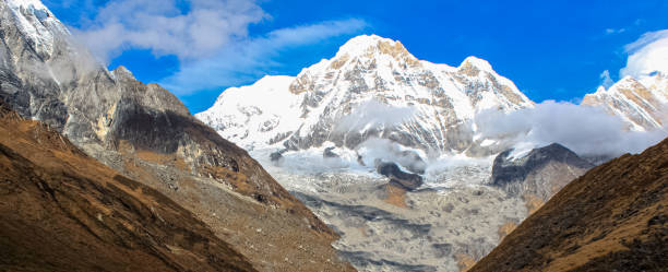 istock Beautiful and Amazing Snow-covered Mountain With Blue Sky 1199322869