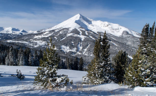 Snowcapped mountain peak in winter stock photo