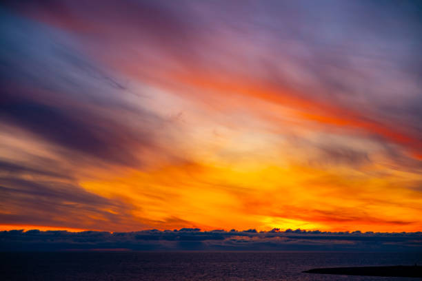 istock Colorful clouds on the sky at sunrise. 1199325527