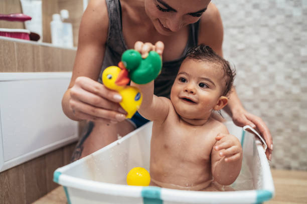istock Mother and Baby Bathtime 1199329552