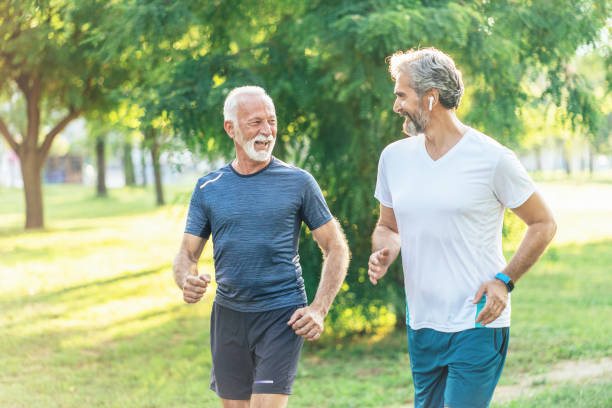 istock Senior friends jogging 1199329557