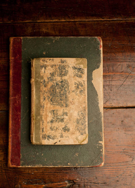 istock retro old books on old wooden table 1199331631