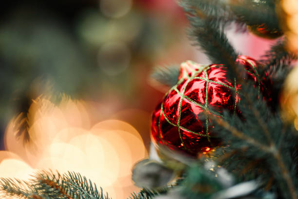 istock christmas-tree decoration bauble on decorated Christmas tree 1199336506