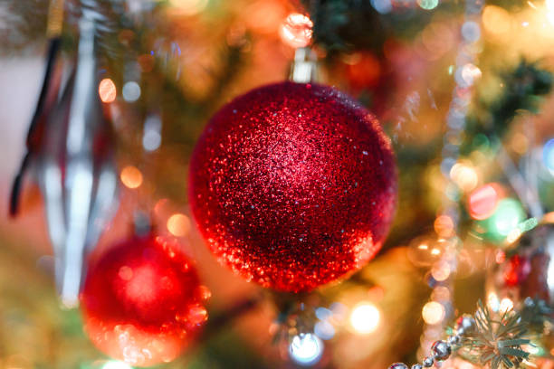 istock christmas-tree decoration bauble on decorated Christmas tree 1199336553
