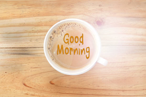 istock Good Morning coffee in cup over wooden table 1199339599