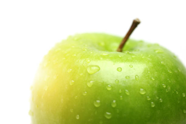 istock Green Apple with Water Droplet on White Background 1199340943