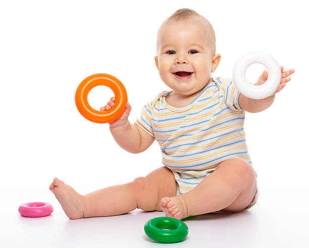 Little boy play with toys stock photo