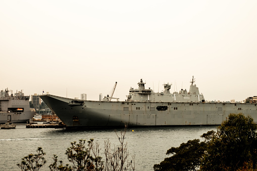 Yokosuka, Japan - May 25, 2023 : JS Izumo (DDH-183) at the Japan Maritime Self-Defense Force's base in Yokosuka, Kanagawa Prefecture, Japan.