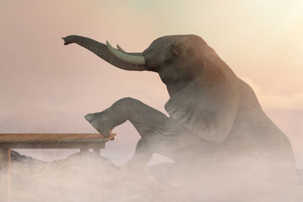 istock Fantasy image of a large elephant leaning on a cliff, 3d render. 1199341998