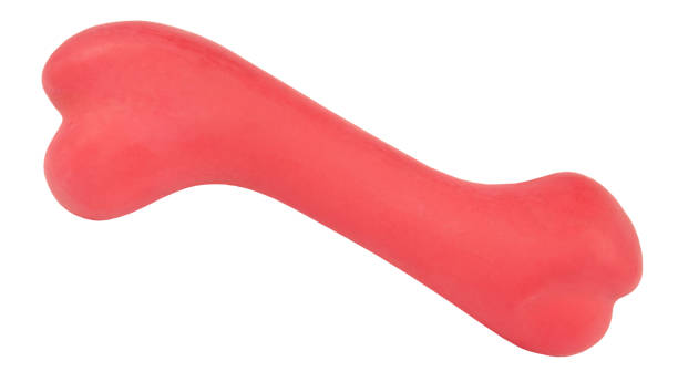 istock Dog bone red pet toy perfect isolated on white background 1199349108