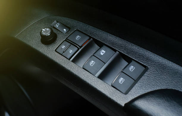 istock Switch on the side of the windshield and the mirror adjustment switch 1199350197