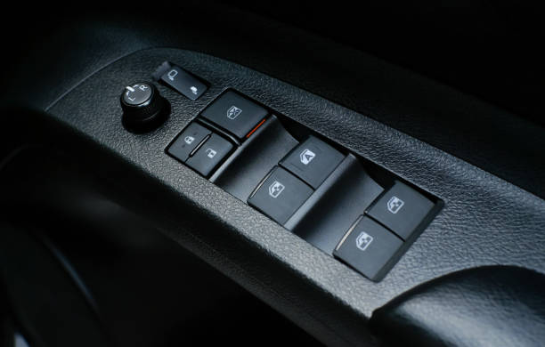 istock Switch on the side of the windshield and the mirror adjustment switch 1199350198