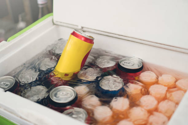 istock Cans of soft drinks in an ice box. 1199350207