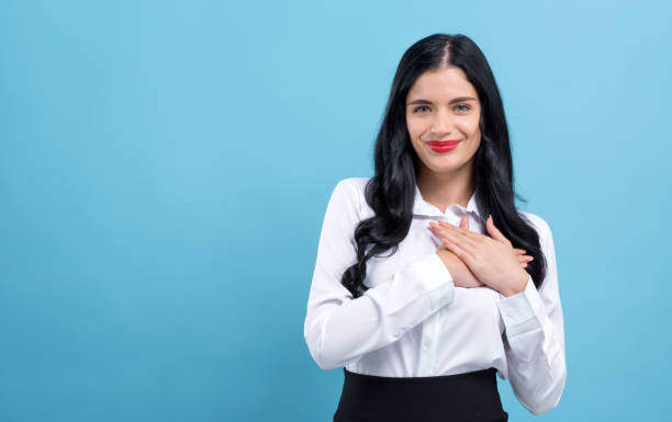 istock Woman with heartfelt expression 1199352778