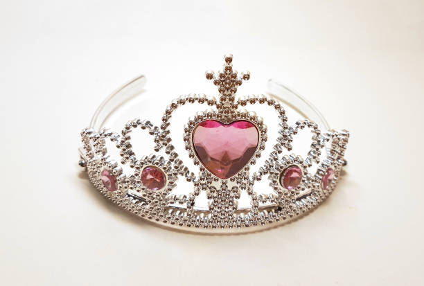istock tiara crown pink  colors isolated  in white background 1199355821