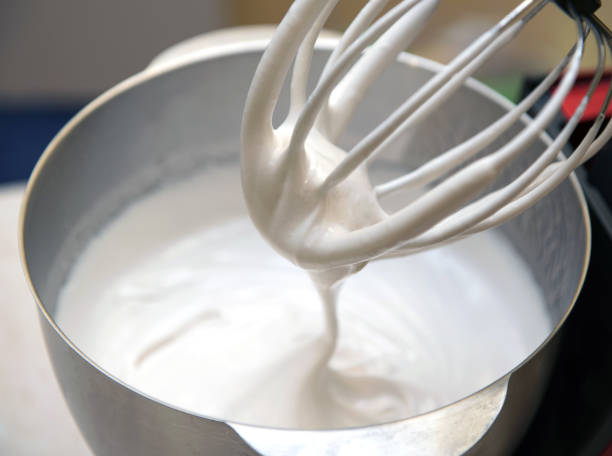 istock Cooking of marshmallow on food processor 1199361121