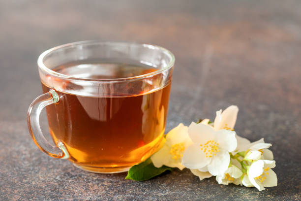istock Cup of tea with jasmine flowers 1199362317