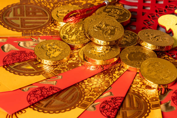 istock New year red envelope with coin shaped chocolates 1199366132