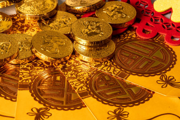 istock New year red envelope with coin shaped chocolates 1199366137