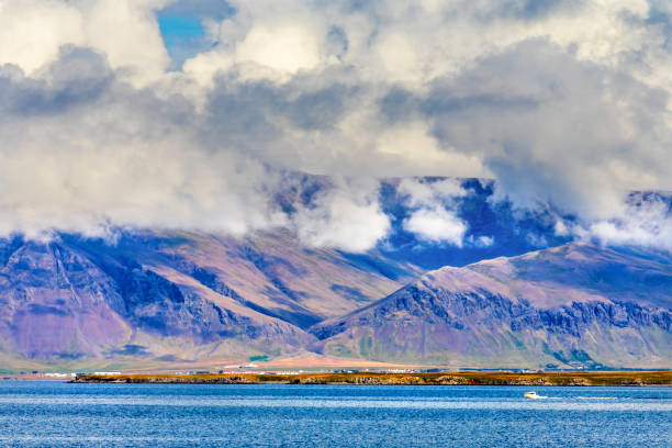 Cloudy Mountains Harbor Reykjavik Iceland. Often the weather in Iceland, Cloudy and Changeable.