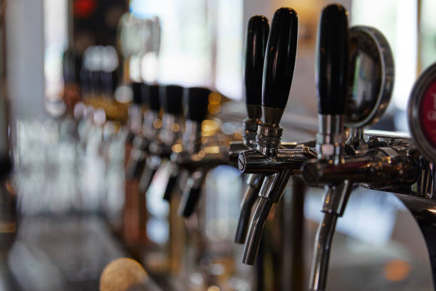 istock iron taps for bottling drinks, alcohol, bar on a blurry background 1199370512