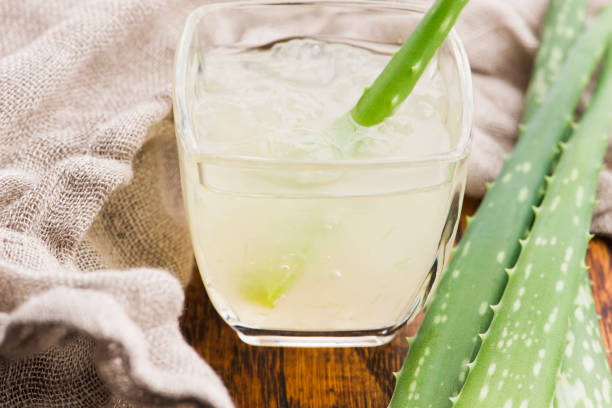 istock Glassware with fresh aloe vera juice and leaves 1199371524