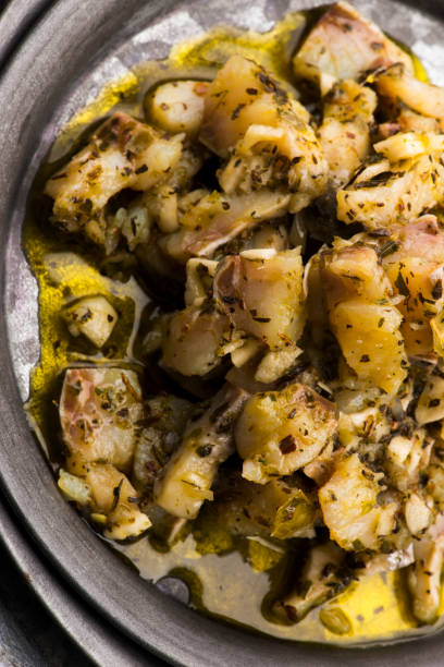 istock Herring salad with garlic, herbs and olive oil 1199375336