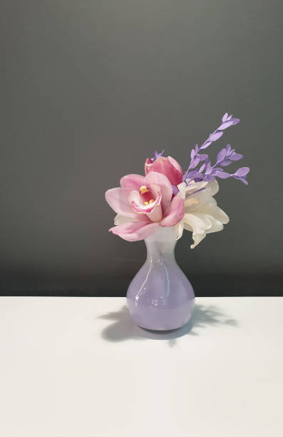 istock a violet vase with white and pink flowers 1199375963