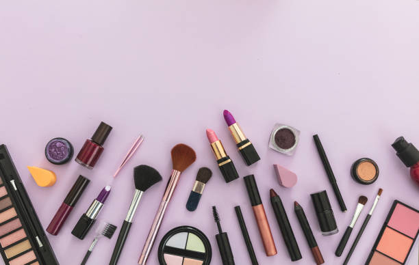 istock Make up cosmetics products against pastel purple background, 1199377609