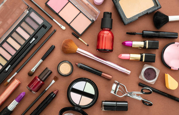 istock Make up cosmetics products against brown color background 1199377617