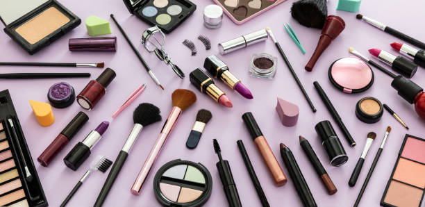 istock Make up cosmetics products against pastel purple background, 1199377621