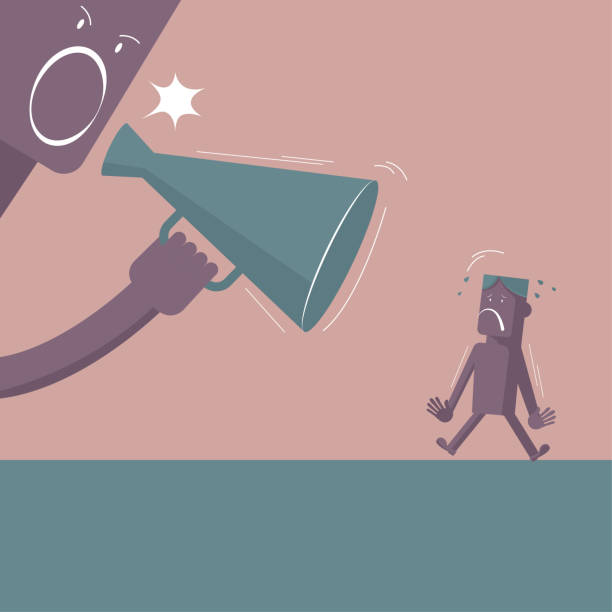 istock A man yelled with a megaphone and the man was frightened. Isolated on brown background. 1199382082