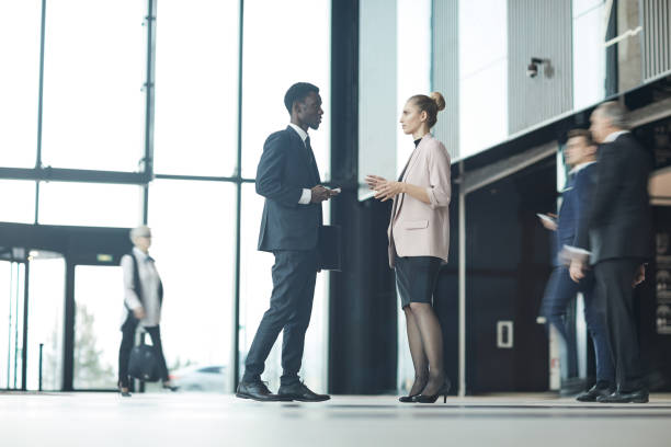 istock Business people standing at office 1199382870