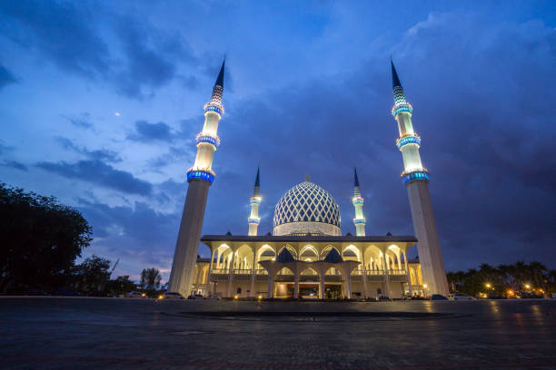 istock The Sultan Salahuddin Abdul Aziz Shah mosque during sunset, Malaysia. Image has grain or blurry or noise and soft focus when view at full resolution. (Shallow DOF, slight motion blur) 1199383058