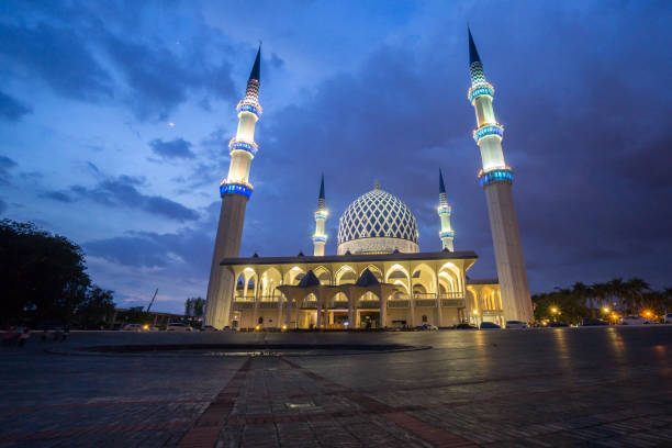 istock The Sultan Salahuddin Abdul Aziz Shah mosque during sunset, Malaysia. Image has grain or blurry or noise and soft focus when view at full resolution. (Shallow DOF, slight motion blur) 1199383062