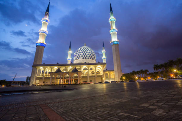 istock The Sultan Salahuddin Abdul Aziz Shah mosque during sunset, Malaysia. Image has grain or blurry or noise and soft focus when view at full resolution. (Shallow DOF, slight motion blur) 1199383066