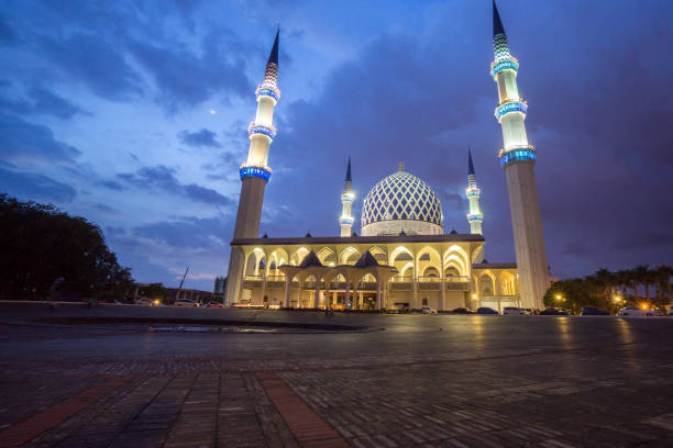 istock The Sultan Salahuddin Abdul Aziz Shah mosque during sunset, Malaysia. Image has grain or blurry or noise and soft focus when view at full resolution. (Shallow DOF, slight motion blur) 1199383070