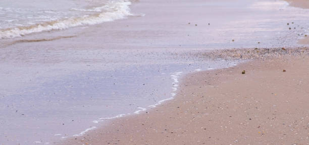 istock Wave and sand . Calm sea. Black Sea Coast. 1199387227