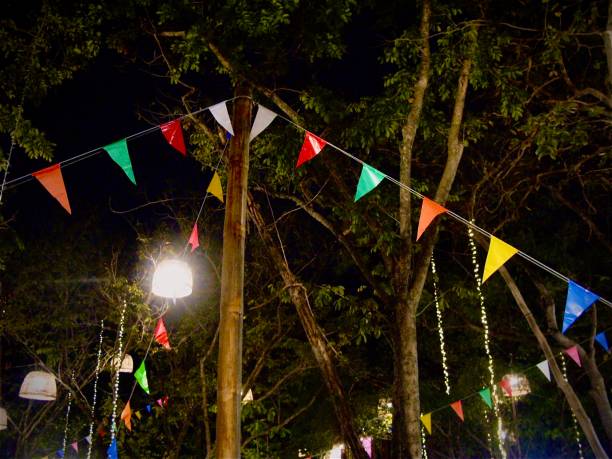 istock Colorful Triangle Flags Hanging on The Pole 1199387945