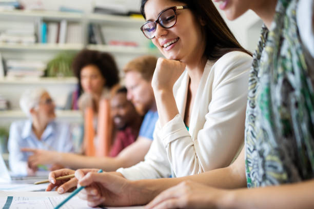 istock Team of colleagues brainstorming together while working in modern office 1199388364