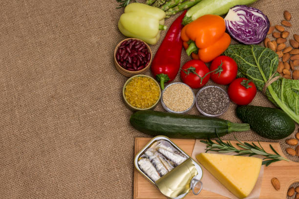 istock Set of healthy food: cheese sardines, leavy vegetables, beans nuts 1199390558